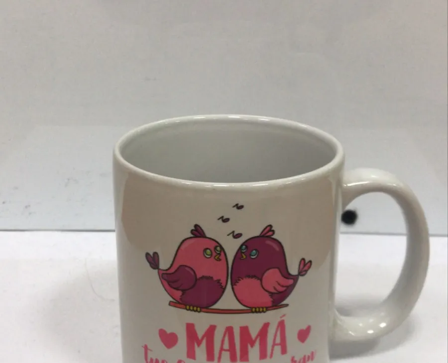 Taza “Mamá, tus besos lo curan todo”